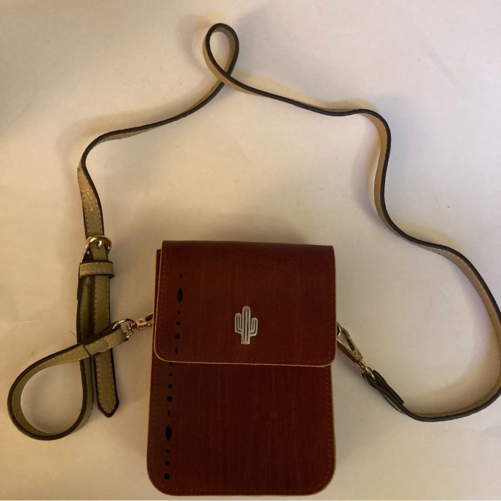 Most Wanted USA leather crossbody red brown purse cutout perforated metal cactus